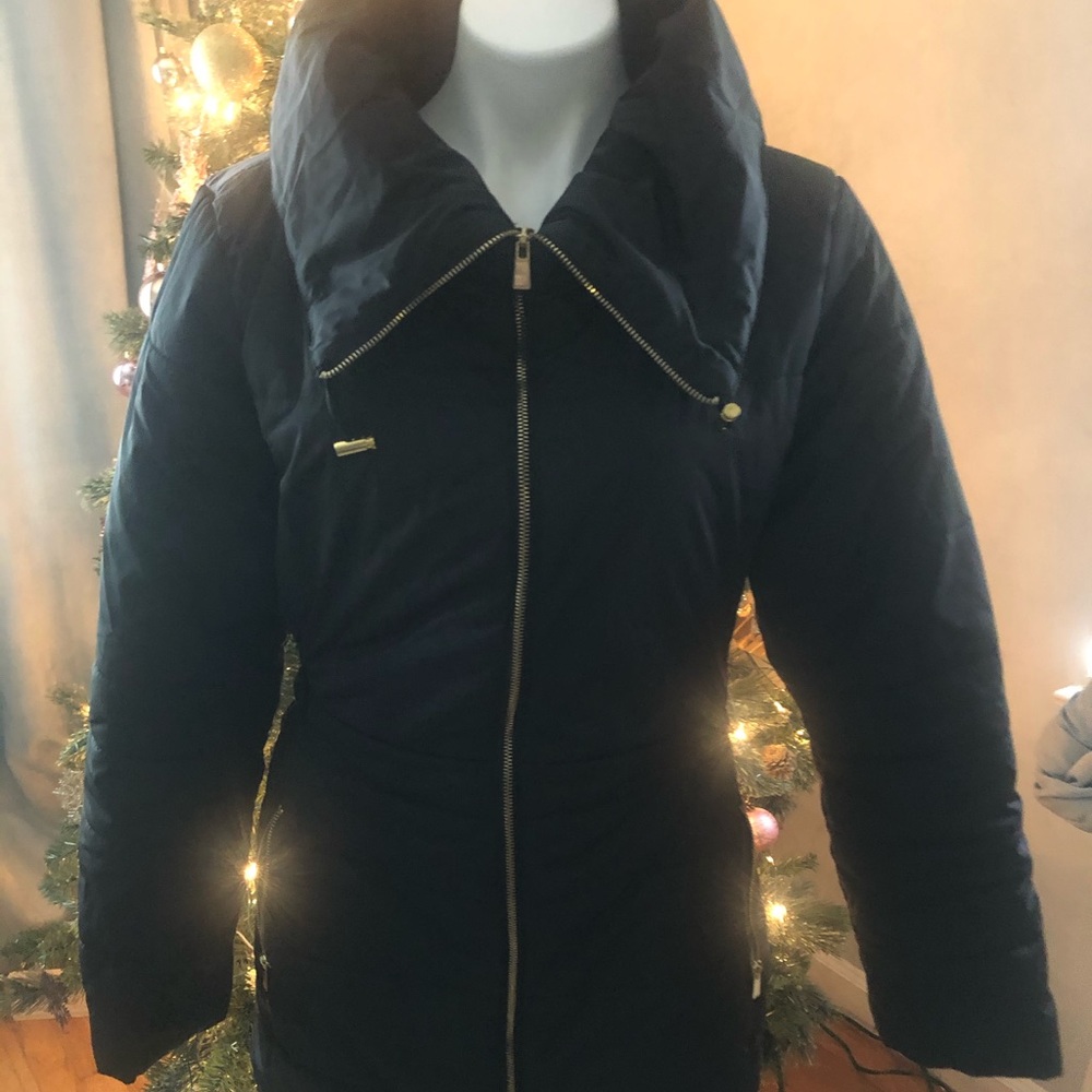 Long black zip up coat with puff collar and hood